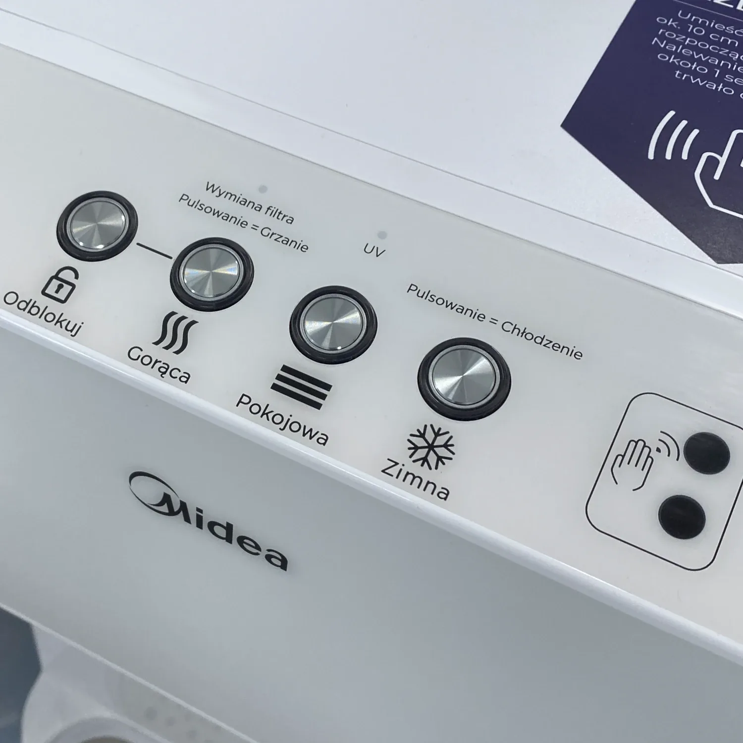 Midea JS1844S — panel sterowania: przyciski Odblokuj, Gorąca, Pokojowa, Zimna i sensor bezdotykowy